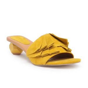 Slip on style block heels from our 'Pleats Please' Collection.

Featuring a canary suede upper with a two-inch assymetric block heel.

Shoe Care:
Wipe with a clean, dry cloth to remove dust.