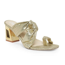 Load image into Gallery viewer, Funky twist to our metallic gold slipon block heels.

Our signature trapeze shape block heel in gold metallic tone featuring a three inch heel with a state-of-the-art sole.
 
Shoe Care:
Wipe with a clean, dry cloth to remove dust.
