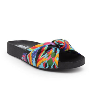 Its beach day!! Planning your next vacation, these are a must and the most comfortable flats! Slip-on style sandals with a knotted bow detailing on top in printed kaleidoscope color Made with super-soft padded lining with a comfy and durable rubber sole.